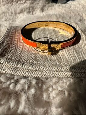 Hermes Kelly Bracelet in Gold-Tone Orange Enamel
